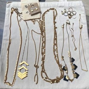 A bunch of Madewell jewelry- necklaces, earrings and stackable rings